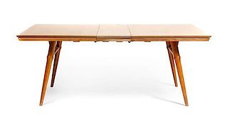 A Russel Wright Maple Extension Table, for Conant Ball, Height 29 7/8 x width 75 3/8 x depth 40 inches.
