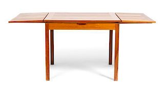 A Danish Teak Extension Table, Height 29 x width 67 3/4 x depth 35 1/2 inches.