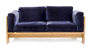 A Tobia Scarpa Oak Bastiano Settee, for Knoll, Height 26 5/8 x width 59 3/8 x depth 30 3/4 inches.
