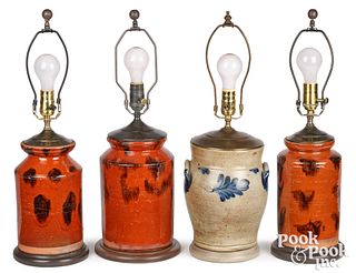 Three redware jars and a stoneware jar