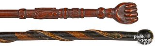 Two carved and painted canes, late 19th c.