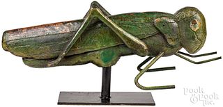 Carved and painted grasshopper weathervane