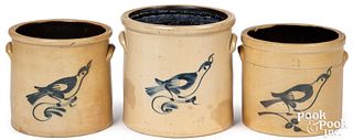Three stoneware crocks with cobalt bird decoration