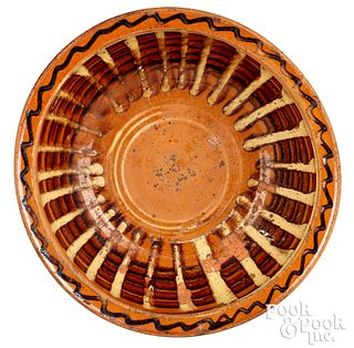 Rare slip-decorated redware bowl