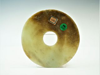 A Chinese Mottled Nephrite Jade Bi Disc, Late Neolithic Period
