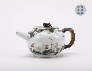 A Chinese famille rose teapot with carnes