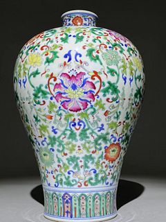 A floral and Vine Enamel Decorated Doucai Vase 