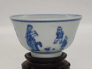 A Blue and White "Teaching Child" Tea Cup - Qing Dynasty