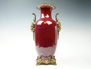 A Red Flambe Vase w/ Brass Foliate Ornamentation