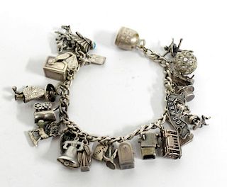 Sterling Silver Bracelet with 21 Assorted Charms