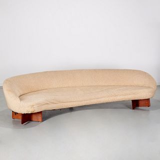 Vladimir Kagan, rare walnut base curving sofa