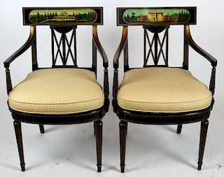 Pair of painted armchairs with caned seats