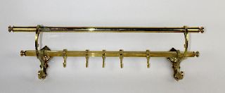Polished Brass coat rack from a train
