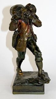 Bronze clad statue of Prohibition man with keg