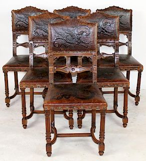 Set of 6 tooled leather chairs with dragons