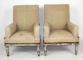 Pair of French armchairs covered in muslin.