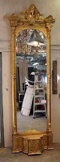 American Empire gilt pier mirror with focal female mask