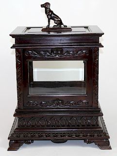 Carved mahogany brandy box with focal dog