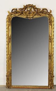 French Louis XV gilt mirror with flowers