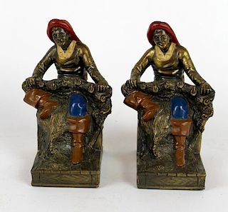 Pair of polychrome brass fisherman bookends