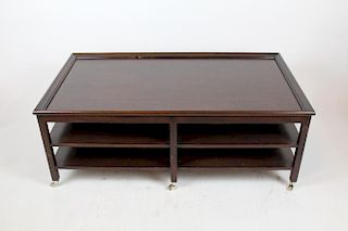 Mahogany 2-tier cocktail table on casters