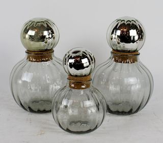 Lot of 3 lidded glass jars with mercury glass tops