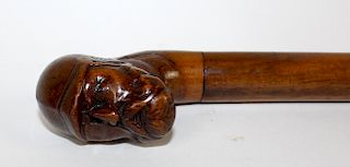 Antique carved walnut cane with POW