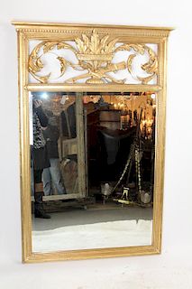 Louis XVI style gilt beveled mirror
