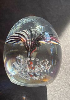 Signed Daum France paperweight with pattern inside 