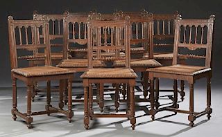 Set of Ten French Henri II Style Carved Oak Dining