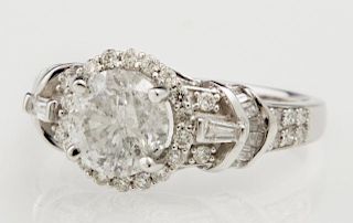 Lady's 18K White Gold Dinner Ring, with a round 1.