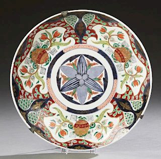 Large Oriental Porcelain Charger, 19th c., with gi