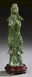 Chinese Carved Jade Kwan Yin, 20th c., on a fitted