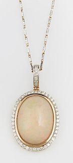 14K Yellow Gold Pendant, with a 22.87 carat oval c