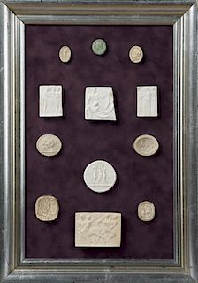 Group of Twelve Plaster Intaglios, 19th c., Grand