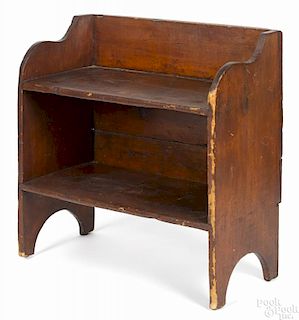 Stained pine bucket bench, 19th c., retaining an old red surface, 30'' h., 30 3/4'' w.
