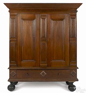 Hudson Valley walnut kas, ca. 1770, with a removable cornice and bun feet, 76'' h., 58'' w.