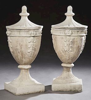 Pair of Covered Cast Stone Garden Urns, 20th c., t