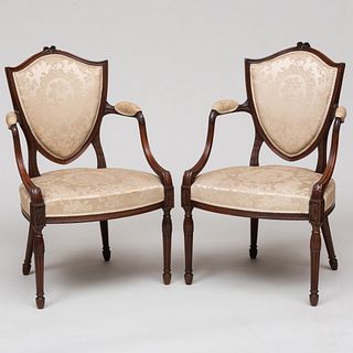 Fine Pair of George III Carved Mahogany Elbow Chairs