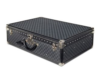 A vintage Louis Vuitton Alzer 75 Damier suitcase