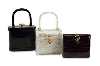 Three vintage acrylic purses