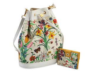 A vintage Gucci floral canvas purse and wallet