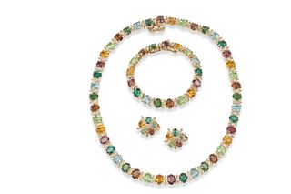 A group of multi-colored stone jewelry