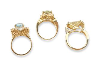 Three 14k gold gemstone cocktail rings