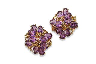 A pair of 14k gold floral amethyst and diamond earrings
