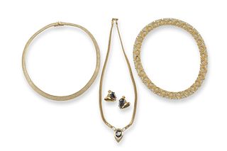 A group of retro-style two-toned jewelry