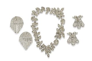A group of vintage cocktail jewelry