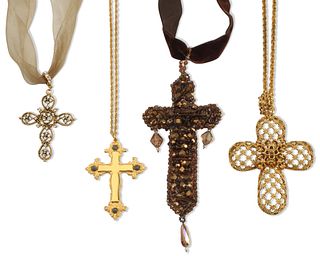 A collection of vintage cross necklaces