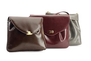 A group of Salvatore Ferragamo leather purses