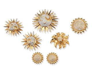 A collection of sun motif jewelry